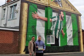 Shad Saleem, owner of Gino's, and Blyth Spartans club photographer Kris Hodgetts with the finished mural.