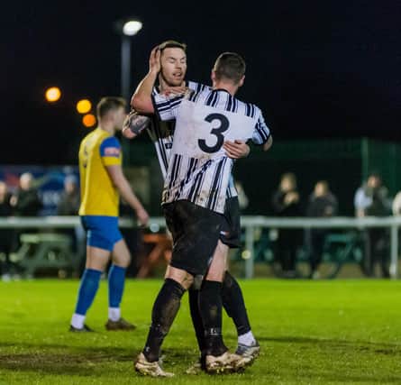 Defender Darren Lough is congratulated by Connor Thomson after scoring the equaliser. Picture: Ian Brodie