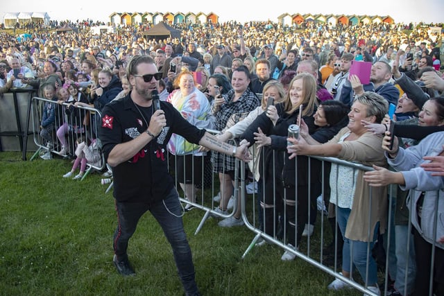 Brian McFadden gets close to delighted fans.