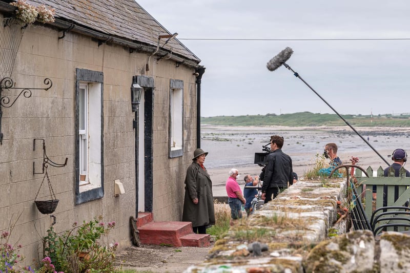 Brenda Blethyn (DCI Vera Stanhope) and co-star Kenny Doughty (DS Aiden Healy) film a scene outside one of the cottages in Boulmer village on Monday, July 16.
