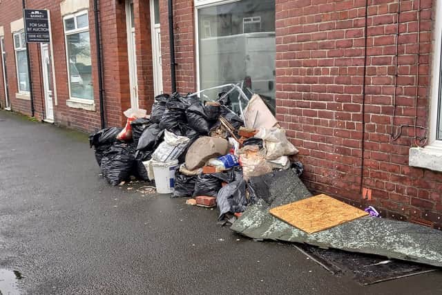 Some of the rubbish found fly-tipped on the pavement in Ashington.