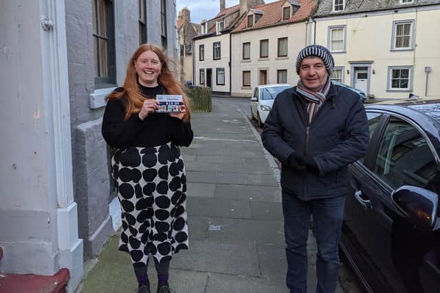 Chloe Smith with her £200 worth of vouchers presented by Stephen Scott, chairman of Berwick Chamber of Trade.