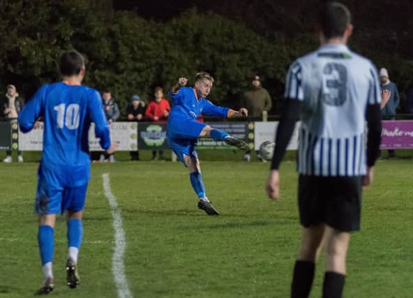 Karl Ross scores the opening goal in Ashington's defeat against Whickham. Picture: Ian Brodie
