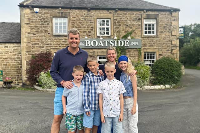 The Middleton family outside The Boatside Inn at Warden.