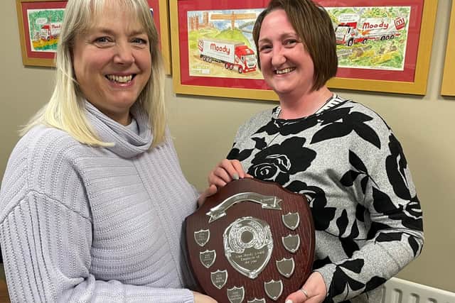 Caroline Moody presents Andrea Ranyard with the Employee of the Year trophy