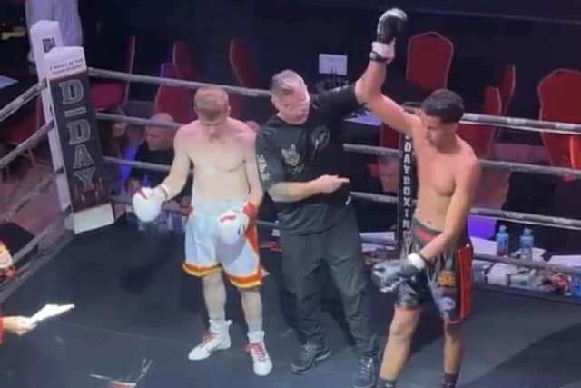 Jermaine Macall (arm raised) who won his fight on Saturday.