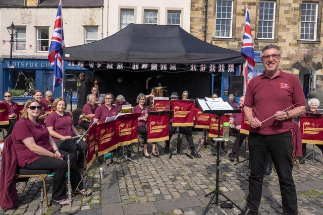 Alnwick Playhouse Band prepares to play to the large crowd.