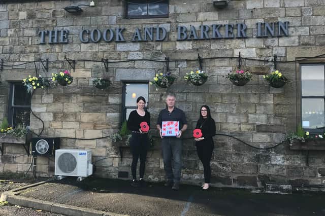 Staff at The Cook and Barker Inn have donated nearly £300 to the Royal British Legion.