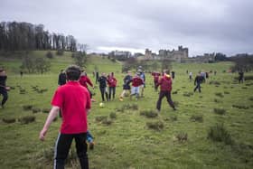 The game is played in the town’s Pastures, in the shadow of Alnwick Castle. Picture by Michael Pearson.