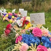 Floral tributes at the A69 crash site. Picture: Northumbria Police