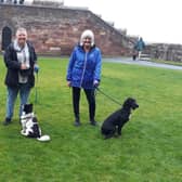 Bamburgh Castle visitors with volunteers