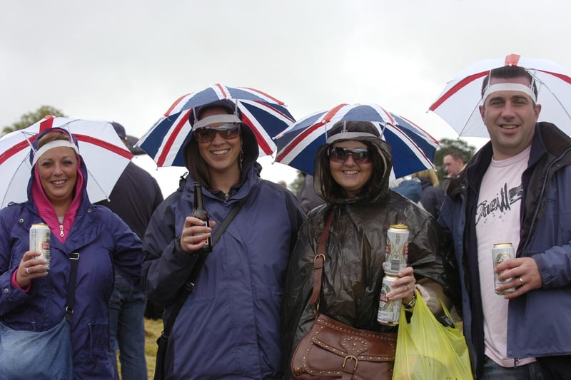 At least their heads stayed dry, while they waited for the first act at the Magic of the 80s concert at Alnwick in 2007.