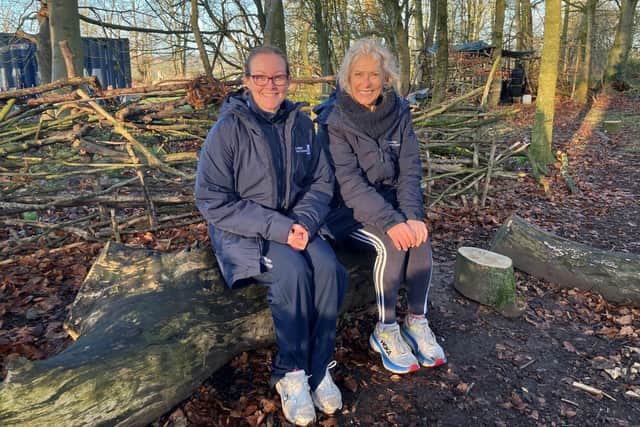 Laura Peters, teacher of sport and outdoor learning, and Morag Smith, outdoor learning lead, prepare for the next class in the woods.