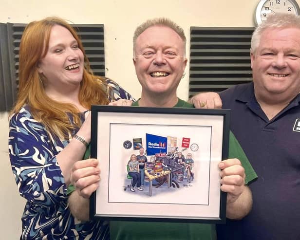 The show team presented Paul with a framed cartoon of the studio and his colleagues by Blyth artist Gail Armstrong as a leaving gift. (Photo by S Goldfinch)