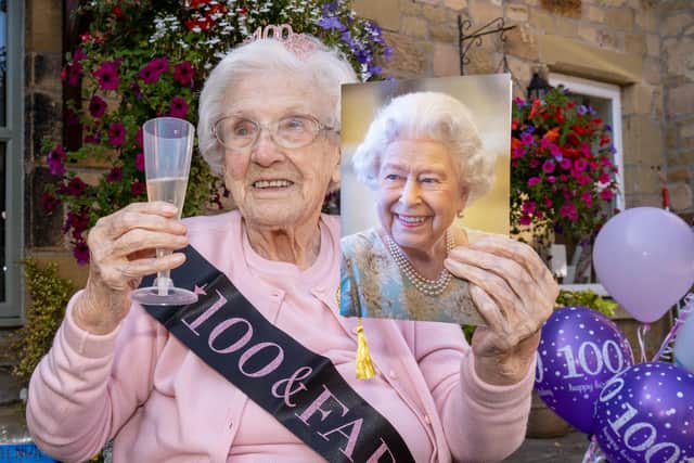 Cissie Wilson, from Summerhill Care Home in Alnwick, with a card from the Queen on her 100th birthday. Picture: Jane Coltman Photography