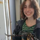 Maria Sutton measuring lobsters.