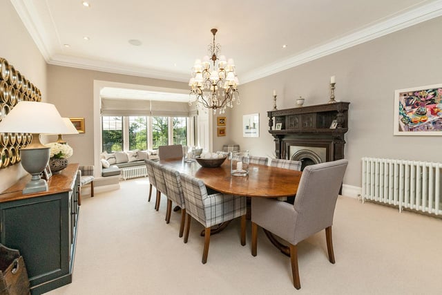 There is an expansive formal dining room which benefits from a beautiful fire and surround as well as mullioned bay windows with window seats.