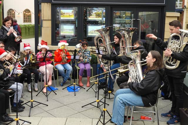 Members of the children’s section joined the Ellington Colliery Band for part of the performance. Picture by Anne Hopper.