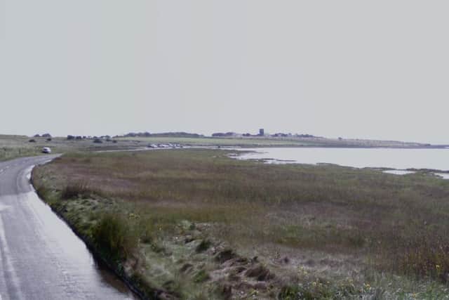 The emergency services were called to the Holy Island Causeway after a vehicle became stuck. Image copyright Google.