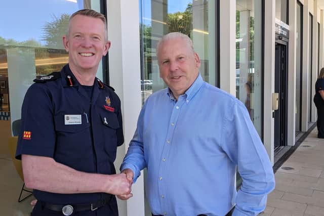 Northumberland Fire and Rescue Service's Graeme Binning with Councillor Gordon Stewart. (Photo by NFRS)
