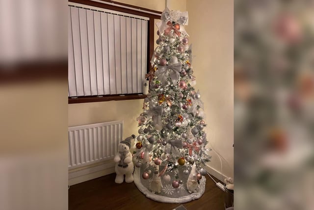 A polar bear stands guard over this spectacular Christmas tree.