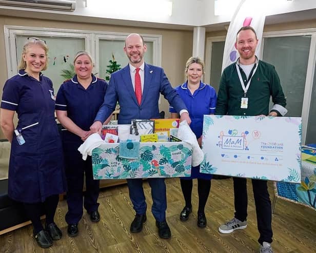 Jamie Driscoll and Sean Soulsby are pictured with health visitors and midwives.