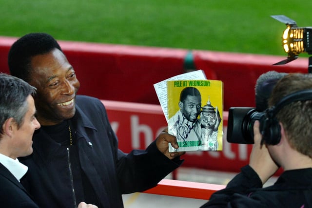 Pele at Bramall Lane, holding the programme from when he played at Hillsborough for Santos against the Owls