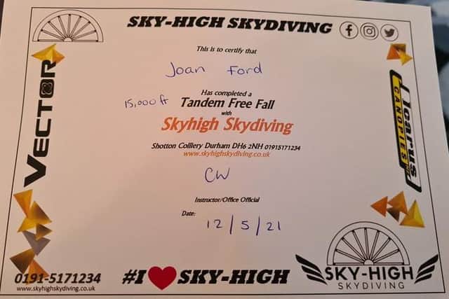 Joan Ford's skydive certificate.
