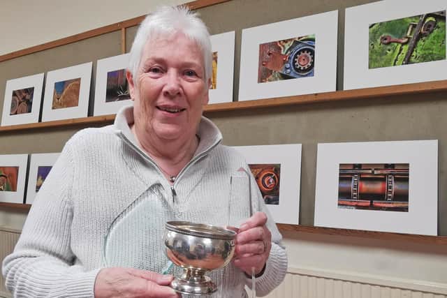 Margaret Whittaker with her panel of mages and the President's Cup. Picture: Jane Coltman