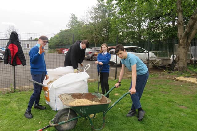Students have transformed the garden by doing landscaping work and building planters. (Photo by Astley Community High School)