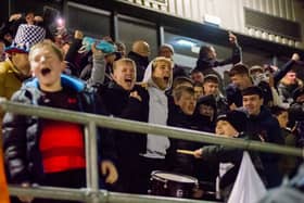 Ashington fans celebrate their last gasp win over West Allotment. Picture by Ian Brodie.