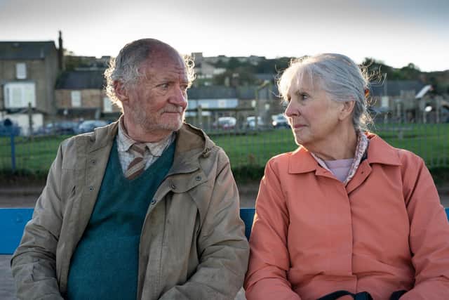 Jim Broadbent and Dame Penelope Wilton are pictured by Jake West during the filming of a scene for the movie at Spittal Promenade.