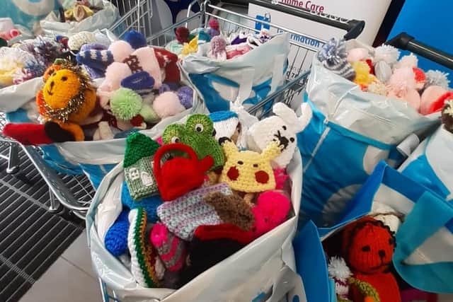 More than 3,000 knitted hats were donated.