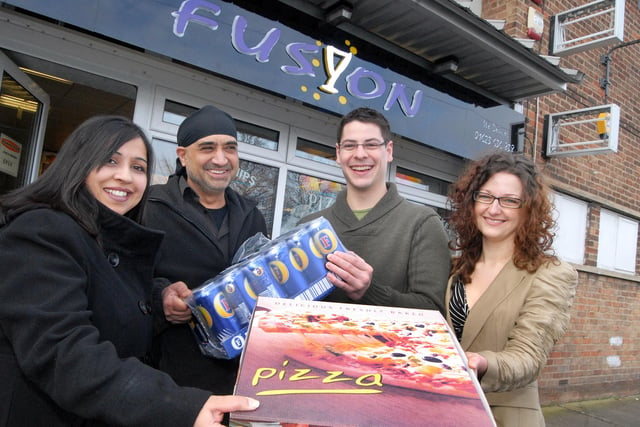 Owners Raaj Takhar and husband Iqbal Singh handed over a pizza and beer prize to Steven Newbury and Gemma Riley back in 2011