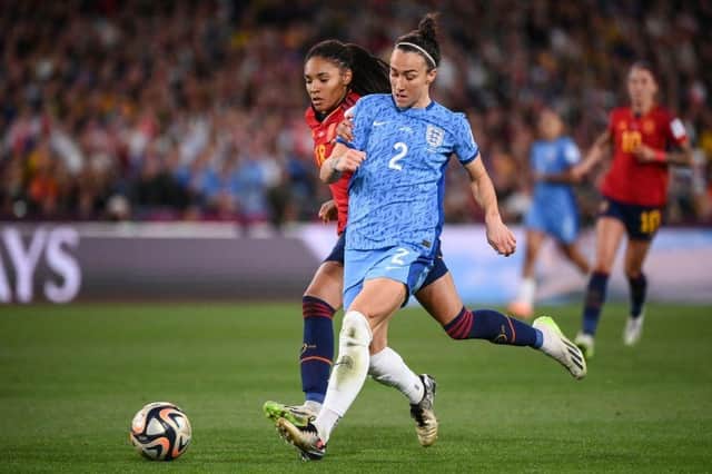 Lucy Bronze runs with the ball past Spain's forward Salma Paralluelo during the Women's World Cup final. Picture: Franck Fife/AFP via Getty Images