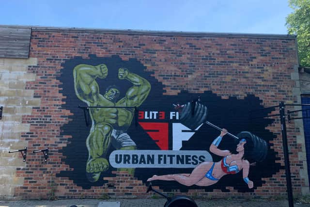 The new Hulk and Wonder Woman mural painted by Steve Badger at Elite Fitness Super Gym in Alnwick.
