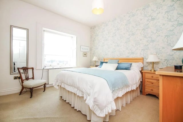 The two other bedrooms, one with additional storage space, offer great views out over the estate.