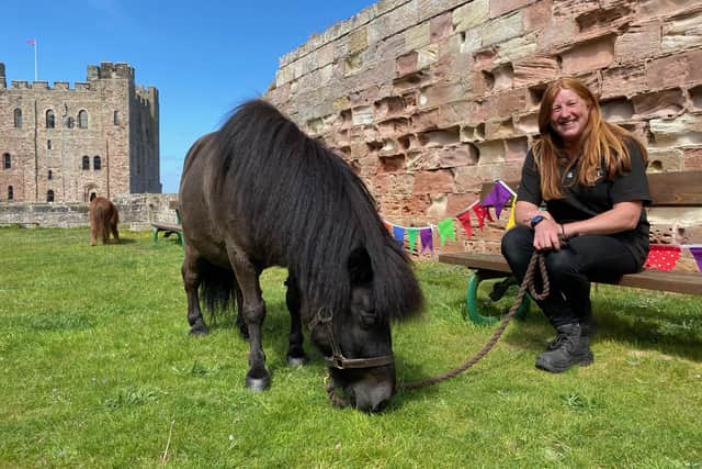 Lisa Walker with Marley who enjoyed a birthday trip to Bamburgh Castle.