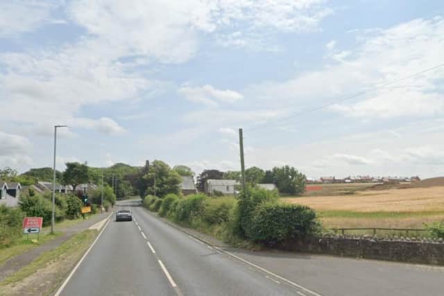 Plans for four houses on a site next to the A697 in Longframlington have been refused.