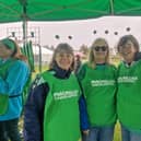 Jacqueline (right) with her sister and friend volunteering at last year's Mighty Hike.