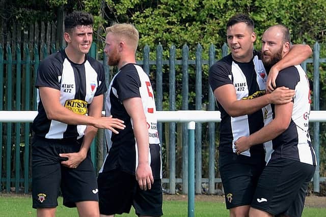 Brad McClelland (second from the right) celebrates his hat-trick during Alnwick Town's 4-1 win at North Shields Athletic. Picture by Steve Miller