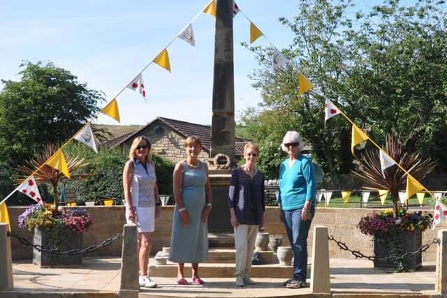 Alnmouth WI steering team members Kathryn Archibald, Judith Williams, Celia Collinson and Pam Muggleton at the memorial.