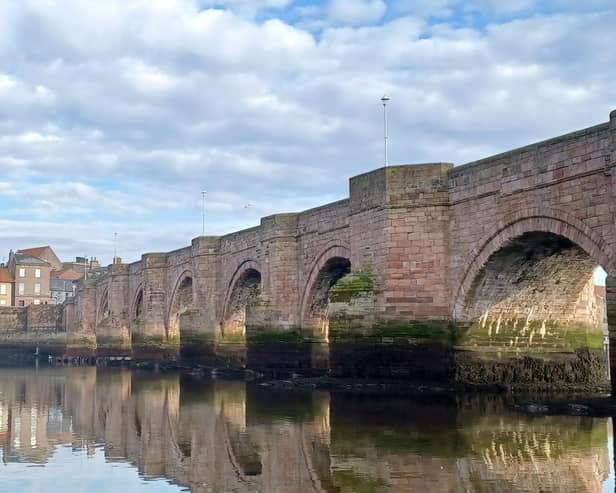 A drone flying over Berwick Old Bridge.