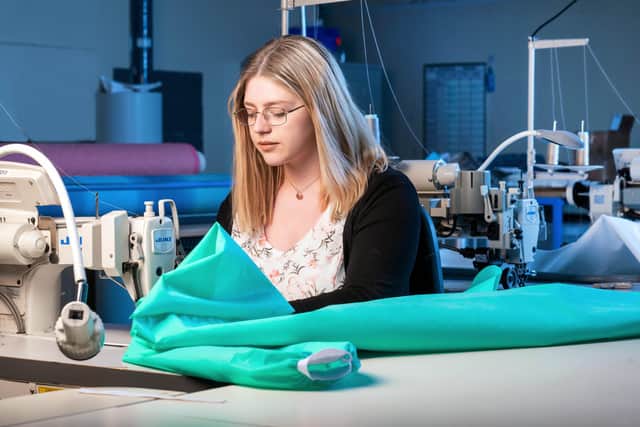 Rebekah Wolfendale, from Darwen, makes scrubs for the NHS at the John Lewis factory.