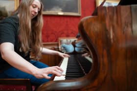 The Broadwood piano being played at Cragside.