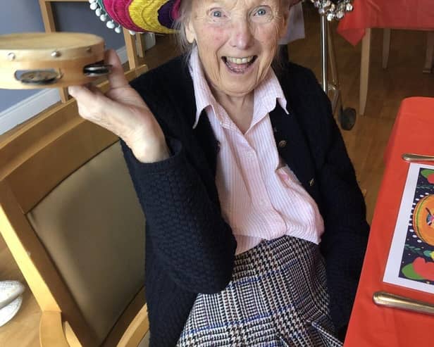 Resident Rosemary enjoying the Mexican music