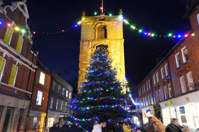 Festive lights and the Christmas tree in front of Morpeth Clock Tower.