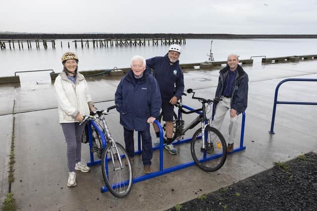 Angela Woodburn, Cllr Jeff Watson and Paul Morrison of Warkworth Harbour Commissioners with Cllr John Riddle.