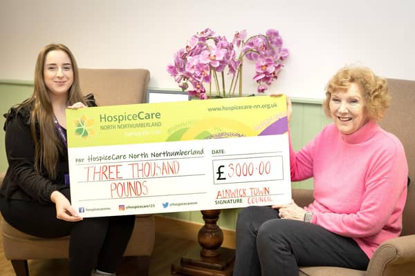 Cllr Sue Allcroft, right, presents a cheque to HospiceCare North Northumberland. Picture: Jane Coltman
