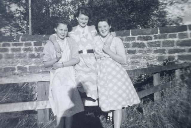 A picture of three girls at Stannington Sanatorium in the 1950s that includes Brenda Bell.